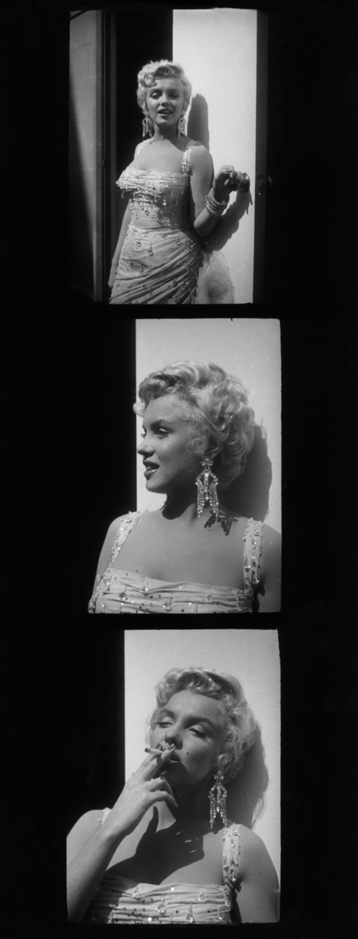 1954: Hoja de os exclusiva con tres fotografías de Marilyn en el set del filme 'There's No Business Like Show Business'. Foto de Gene Lester/Getty Images