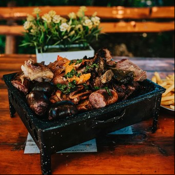 Escapate a solo 90 minutos de CABA: la parrilla que sirve el asado criollo más sabroso